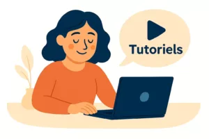 Illustration d’une jeune femme qui s’occupe de la section Tutoriels sur son site web, concentrée devant son ordinateur portable.