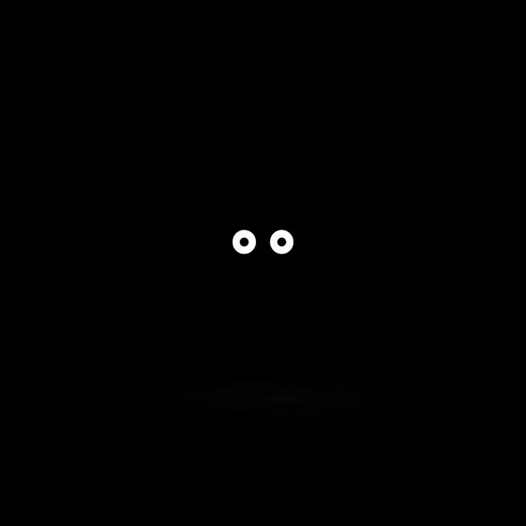 Les yeux lumineux de KIRO apparaissant dans l’obscurité totale.
